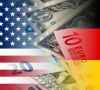 US- und Deutschlandflaggen mit Euro- und Dollar-Banknoten