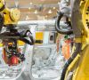 Fanuc-Roboter arbeiten an einem BMW-Fahrzeug.