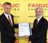 Anlässlich des 25-jährigen Firmenjubiläums erhielt Fanuc Robotics Deutschland eine Ehrenurkunde